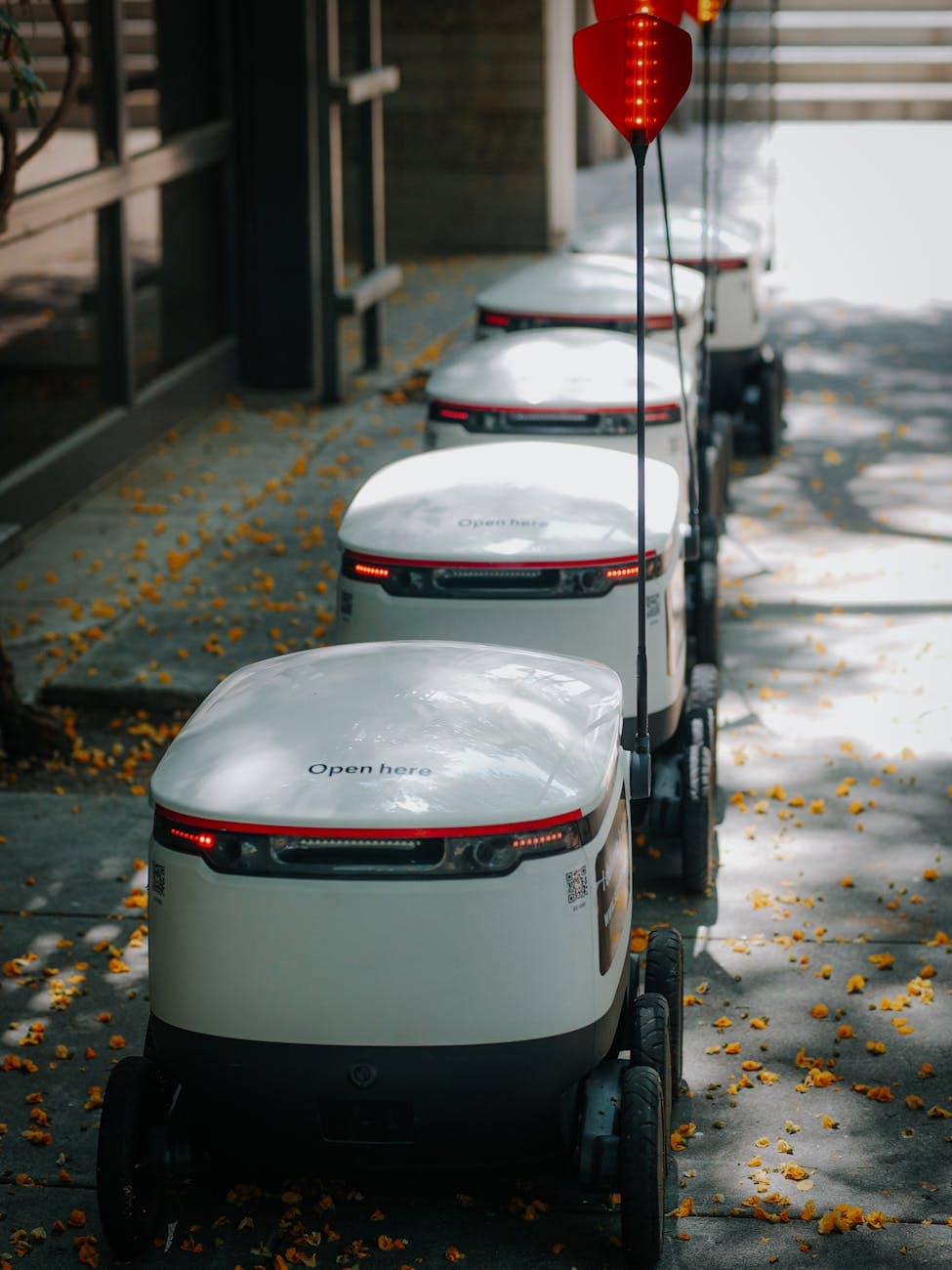 high angle shot of delivery robots